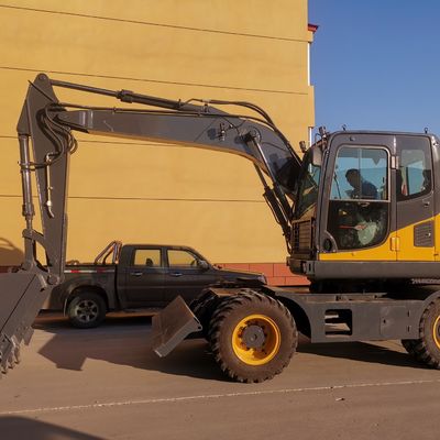مینی بیل مکانیکی چرخدار سطلی چرخ دار 2200 دور در دقیقه با موتور کامینز